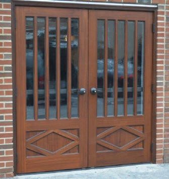 Custom mahogany and glass double doors made for commercial building